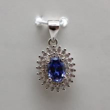 Load image into Gallery viewer, BLUE and MYSTIC TOPAZ CUBIC ZIRCONIA STERLING SILVER PENDANT (OVAL)