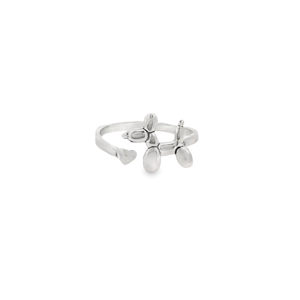 Silver ring with balloon dog on a white background