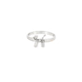 Silver ring with a small design on a white background
