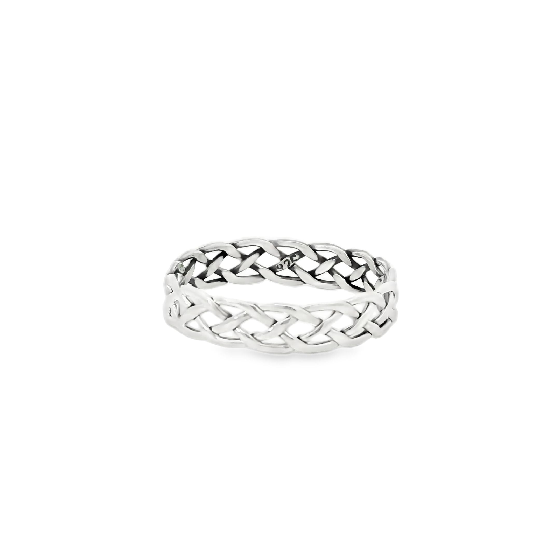 Silver braided ring on a white background