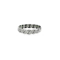 Silver ring with a wavy design on a white background