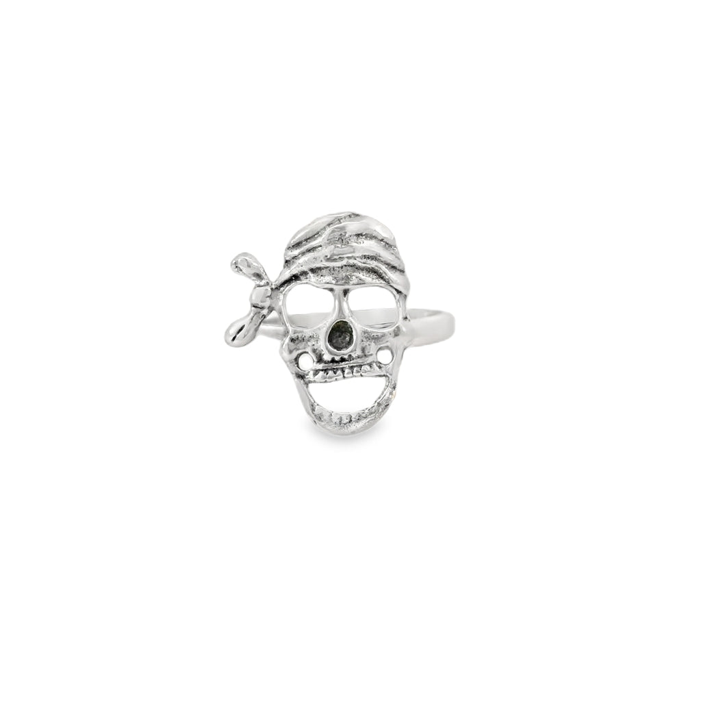Silver skull ring on a white background
