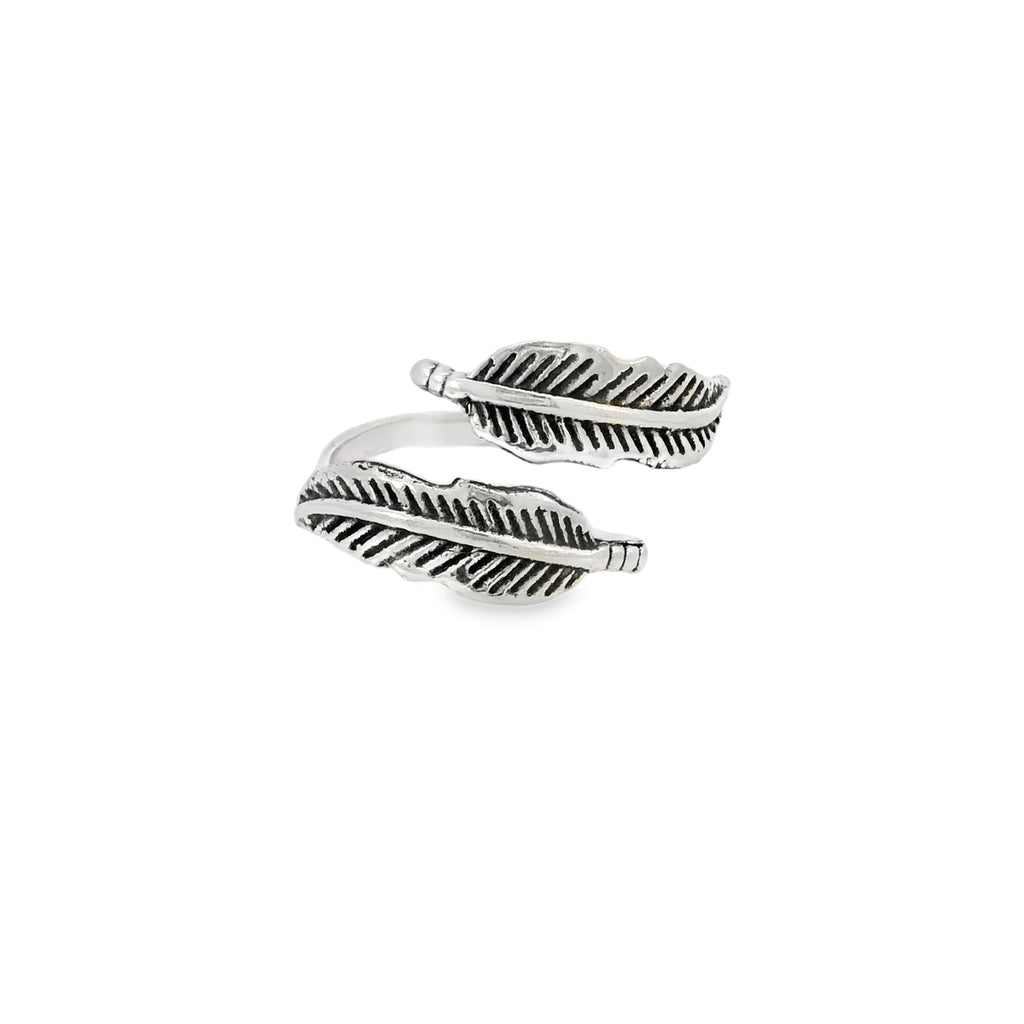 Pair of silver feather-shaped rings on a white background
