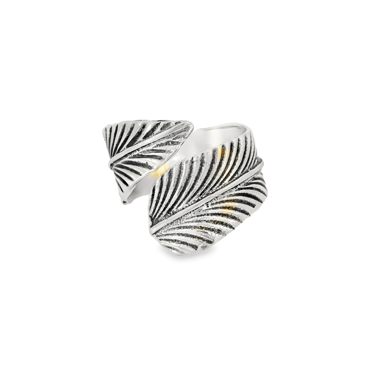 Silver feather-shaped ring on a white background