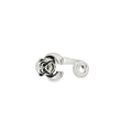 Silver ring monkey design on a white background