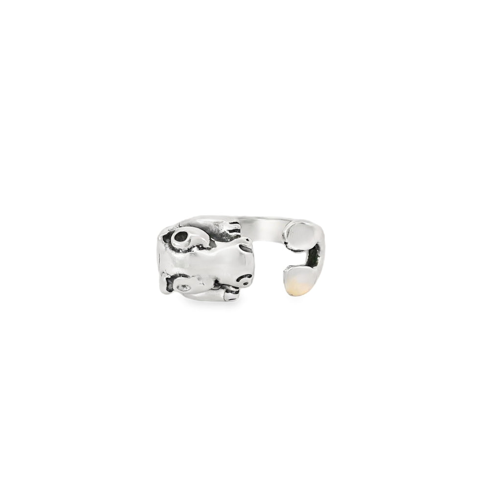 Silver ring with hippo on a white background