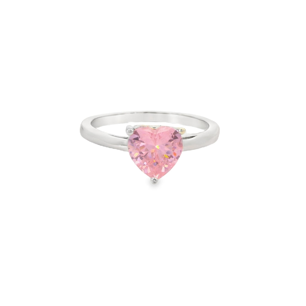A silver ring featuring a heart-shaped pink gemstone in a prong setting, shown against a plain white background.