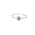 A silver ring with a round blue evil eye centerpiece surrounded by cubic zirconia