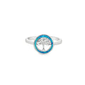Silver ring with a blue  opal  and tree of life design on a white background