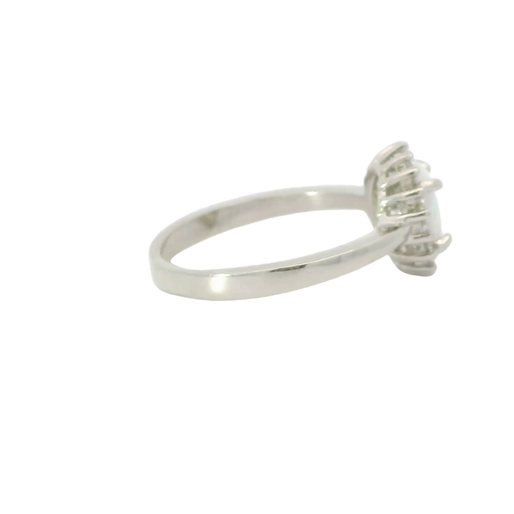 White opal sterling silver ring with cubic zirconia