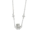Silver bracelet with paw pendant on a white background