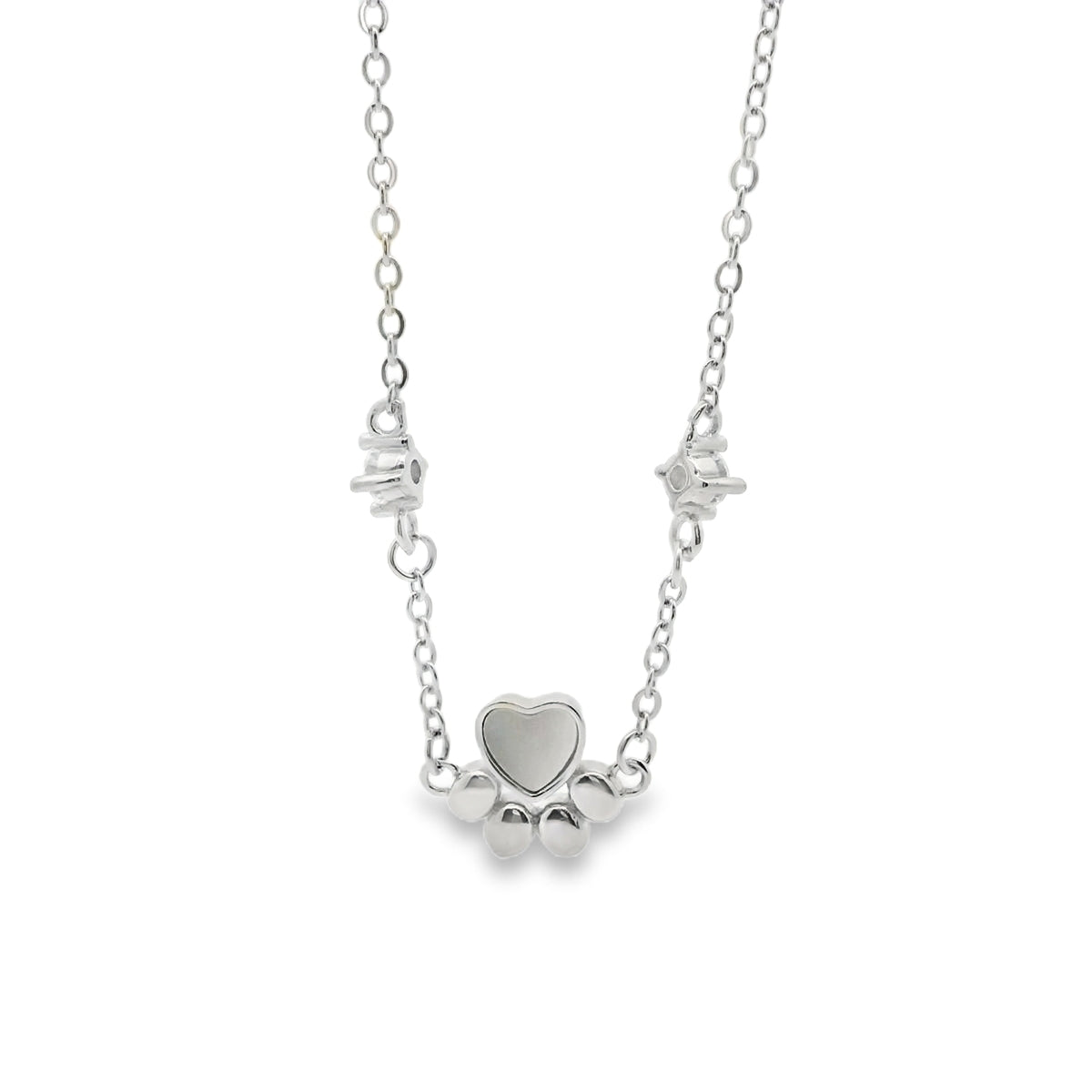 Silver bracelet with paw pendant on a white background