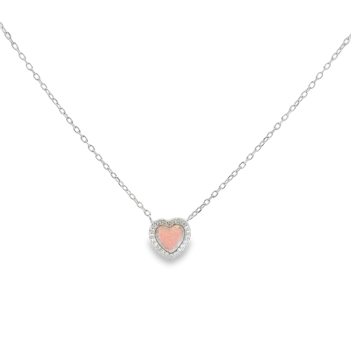 Heart-shaped pink pendant on a silver chain against a white background