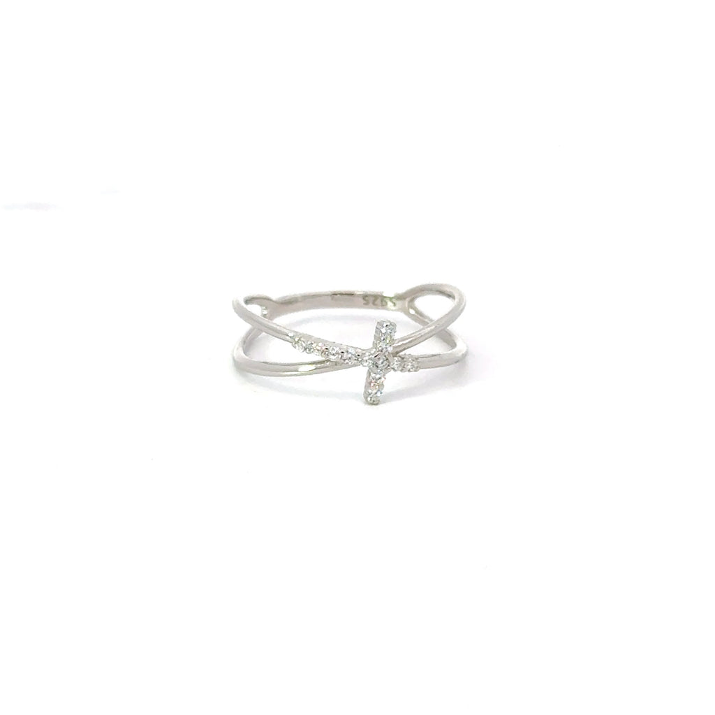 A sterling silver ring with a white cubic zirconia cross design.