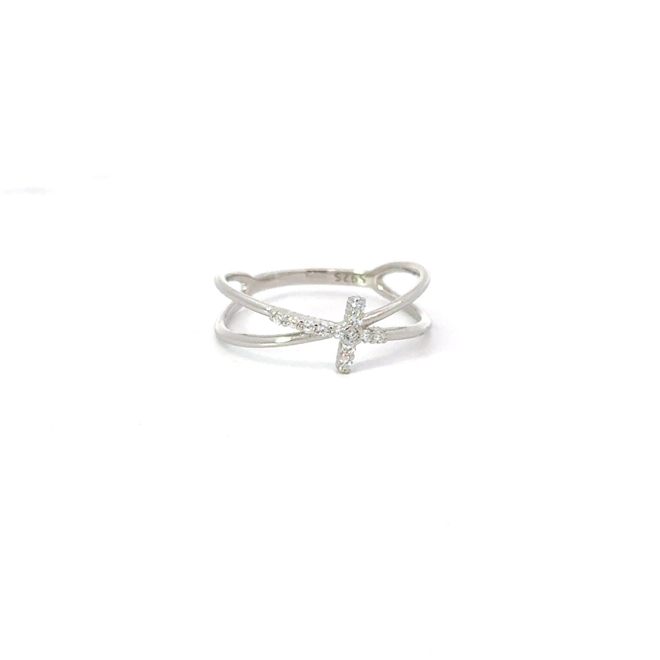 A sterling silver ring with a white cubic zirconia cross design.