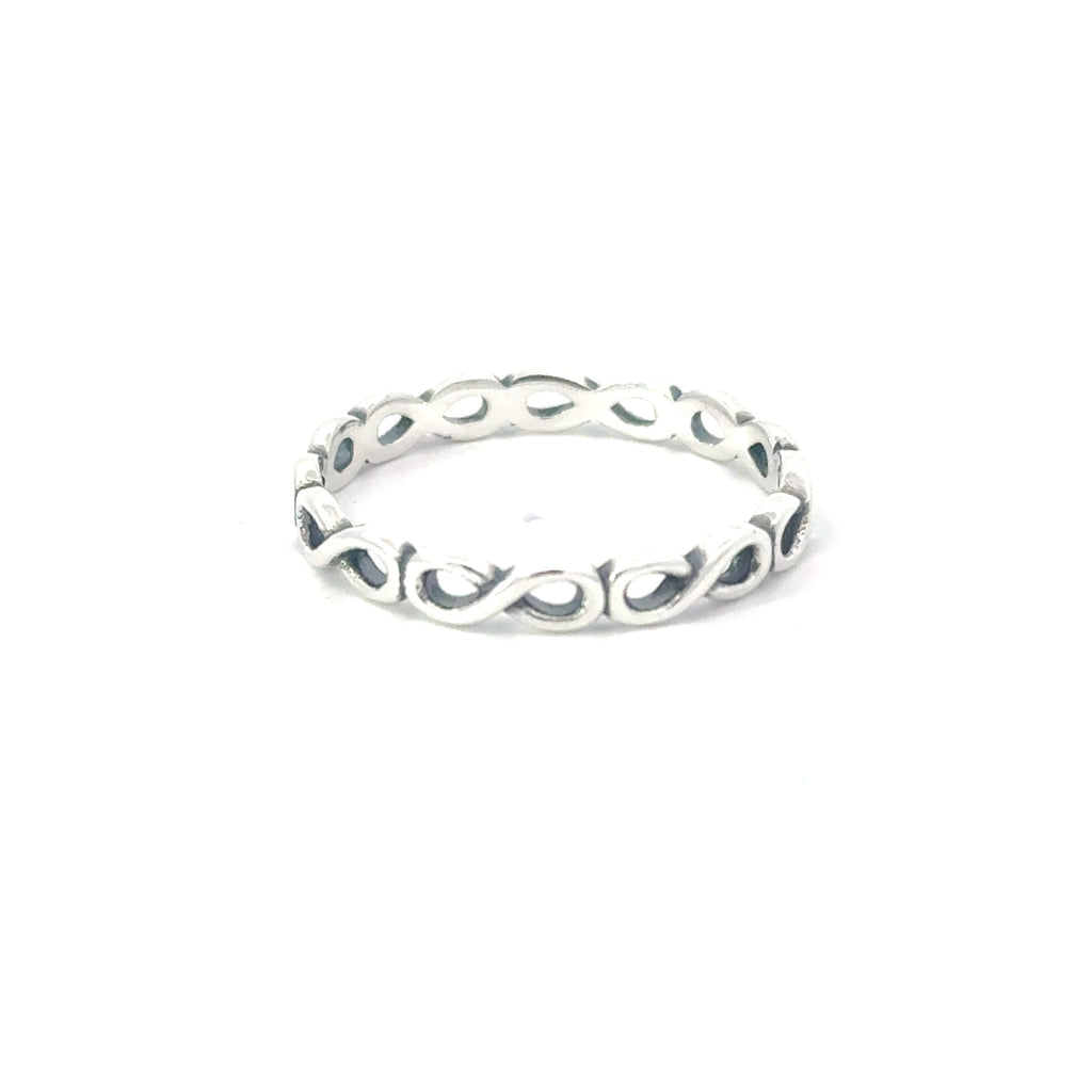A sterling silver ring with a geometric infinity pattern design