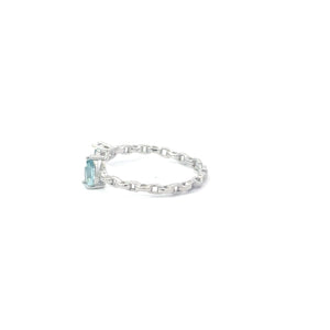 AQUAMARINE CUBIC ZIRCONIA STERLING SILVER RING (PRINCESS & PEAR)