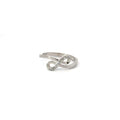 A white cubic zirconia sterling silver ring in an infinity shape design, with the ring positioned diagonally.