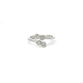 A white cubic zirconia sterling silver ring with an infinity symbol design.
