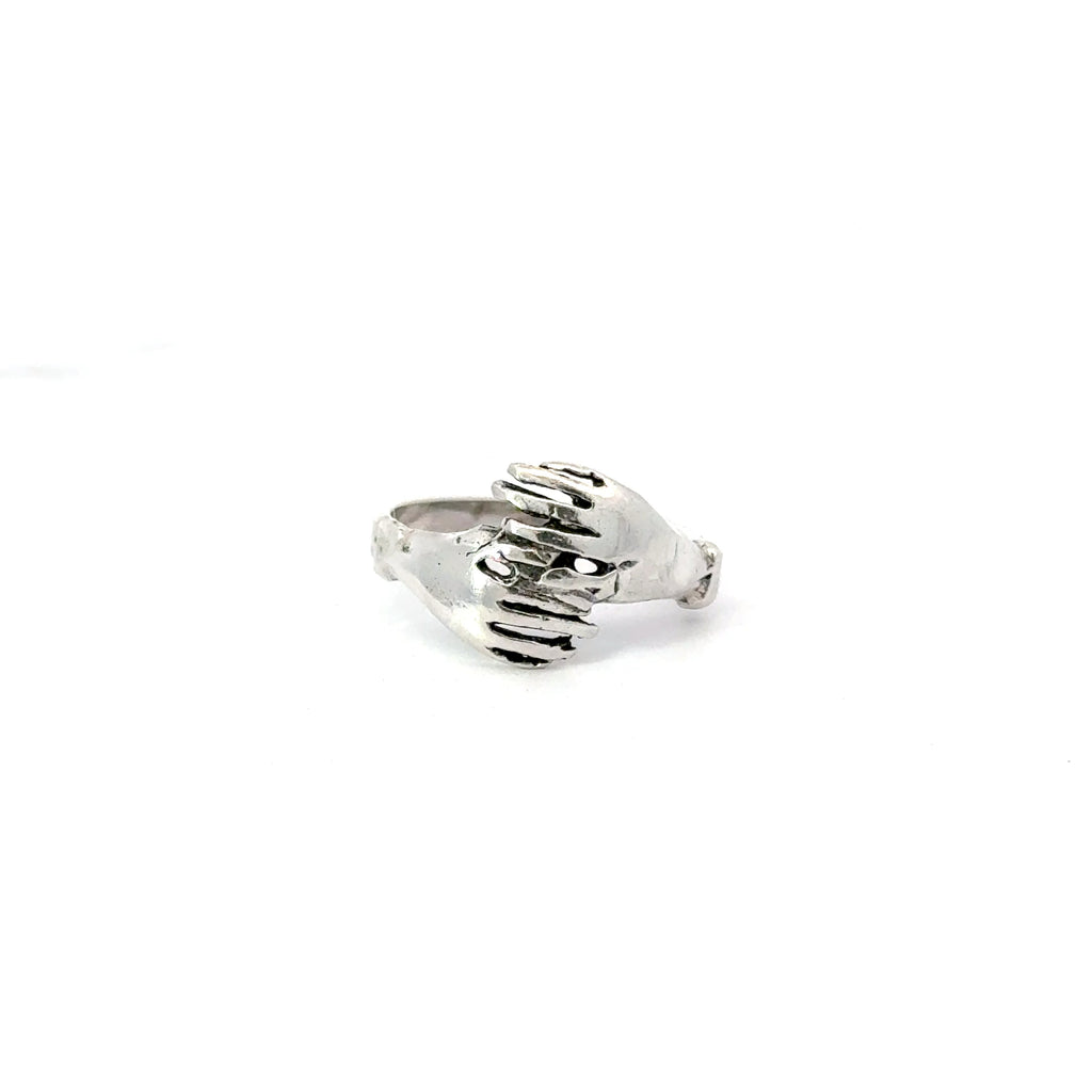 Sterling silver hugging hands ring