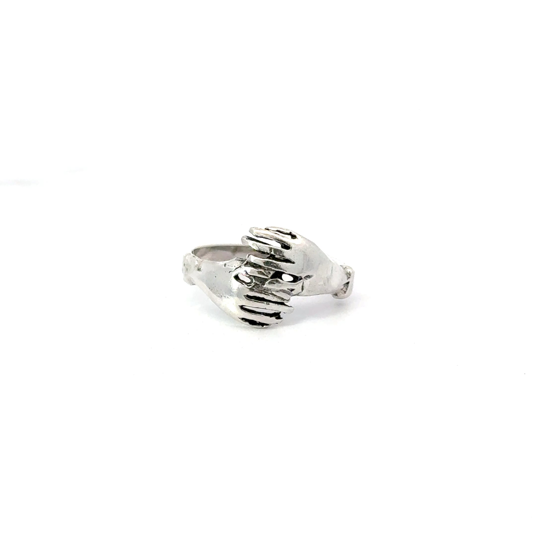 Sterling silver hugging hands ring