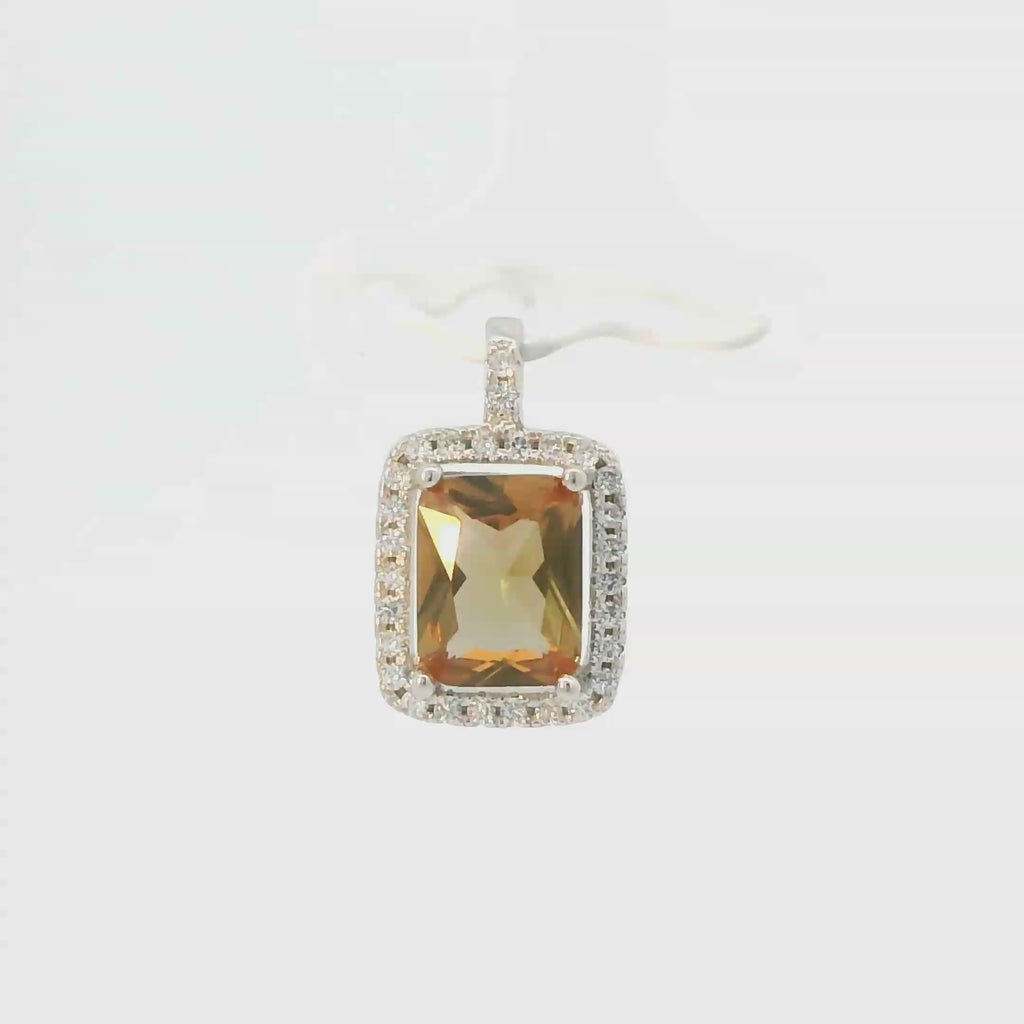 ZULTANITE CUBIC ZIRCONIA STERLING SILVER PENDANT, THE COLOR OF THE STONE CHANGES WITH DIFFERENT LIGHTING (EMERALD SHAPE)