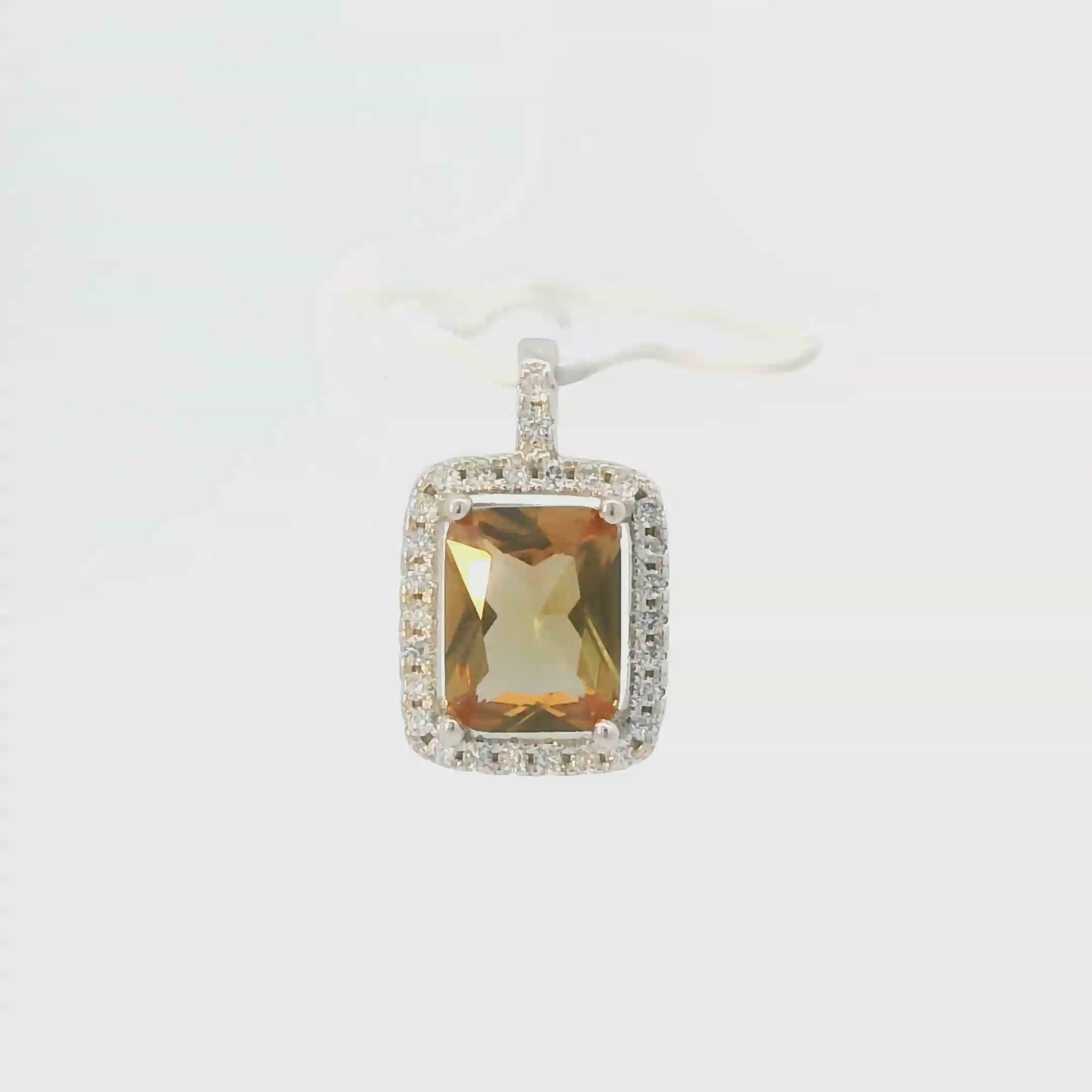 ZULTANITE CUBIC ZIRCONIA STERLING SILVER PENDANT, THE COLOR OF THE STONE CHANGES WITH DIFFERENT LIGHTING (EMERALD SHAPE)