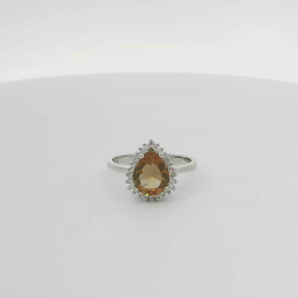 ZULTANITE RING, CUBIC ZIRCONIA STERLING SILVER , THE COLOR OF THE STONE CHANGES WITH DIFFERENT LIGHTING (PEAR SHAPE)
