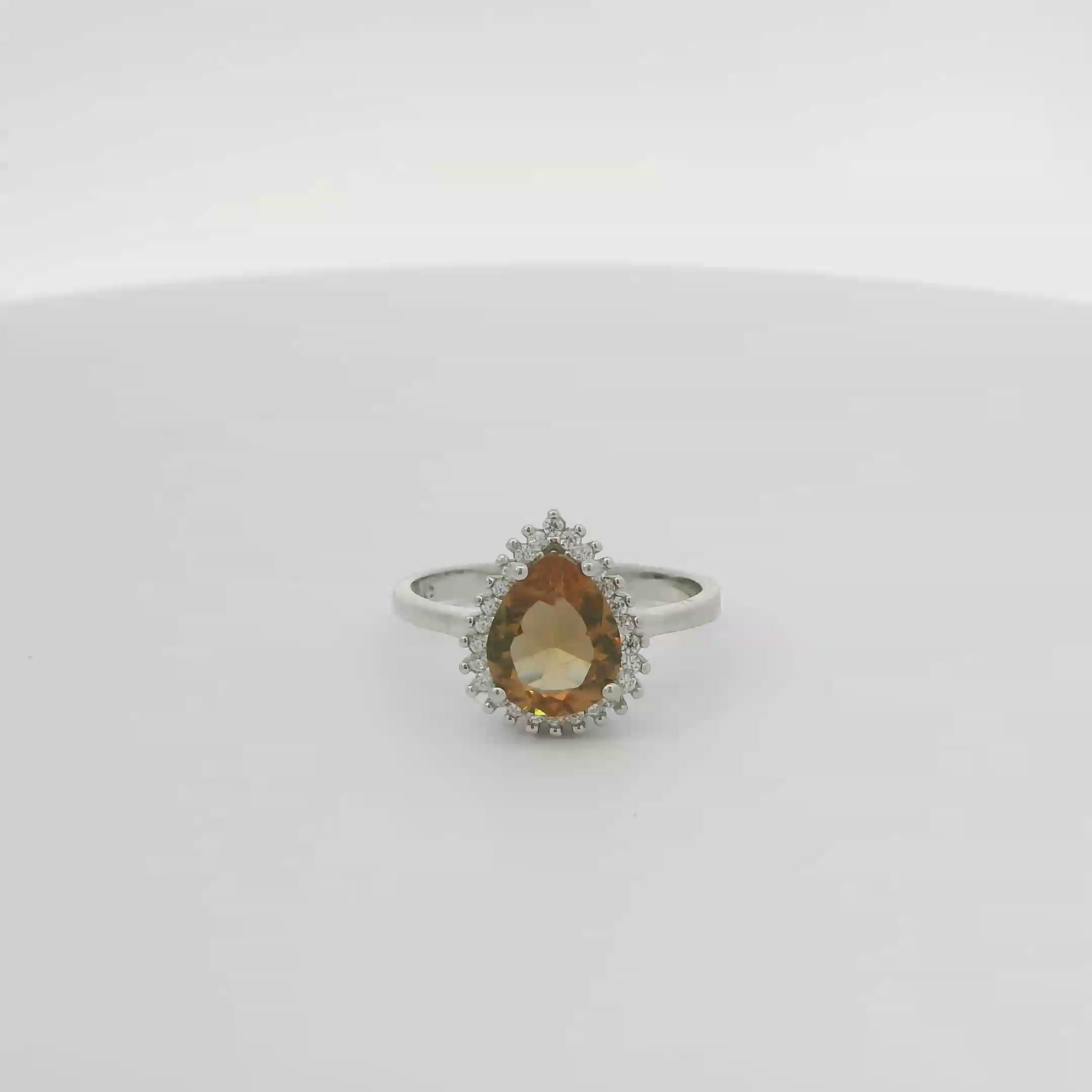 ZULTANITE RING, CUBIC ZIRCONIA STERLING SILVER , THE COLOR OF THE STONE CHANGES WITH DIFFERENT LIGHTING (PEAR SHAPE)