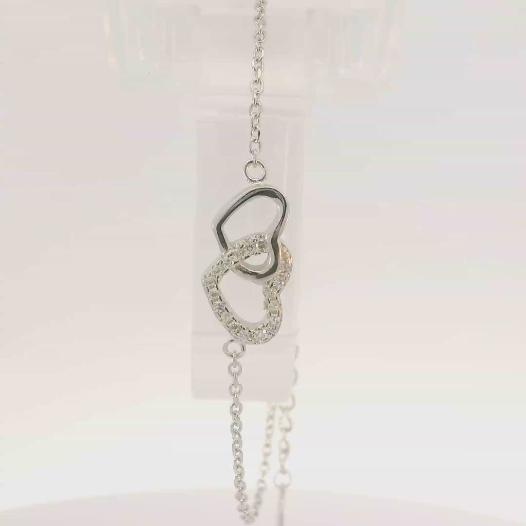 CUBIC ZIRCONIA STERLING SILVER BRACELET (HEARTS)