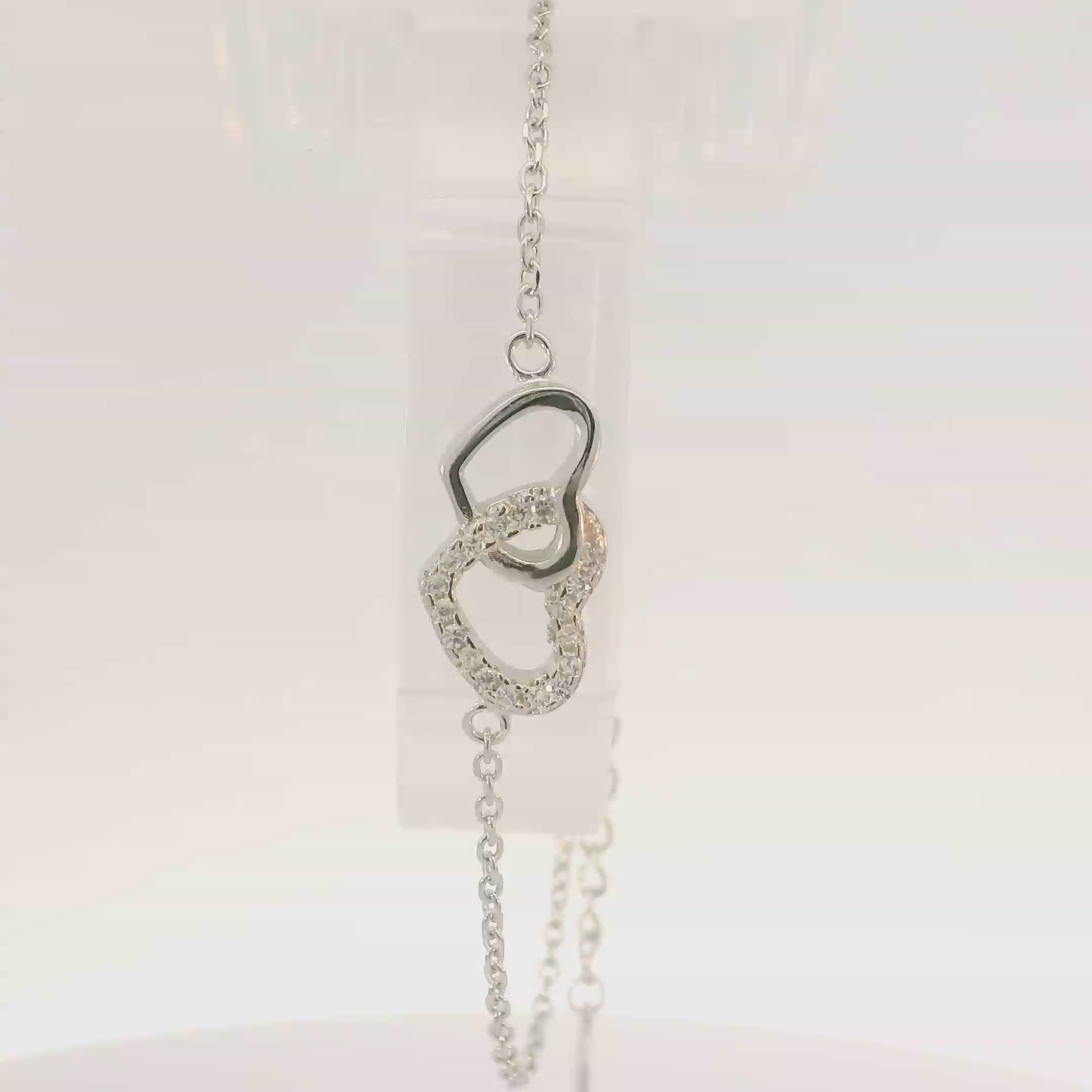CUBIC ZIRCONIA STERLING SILVER BRACELET (HEARTS)