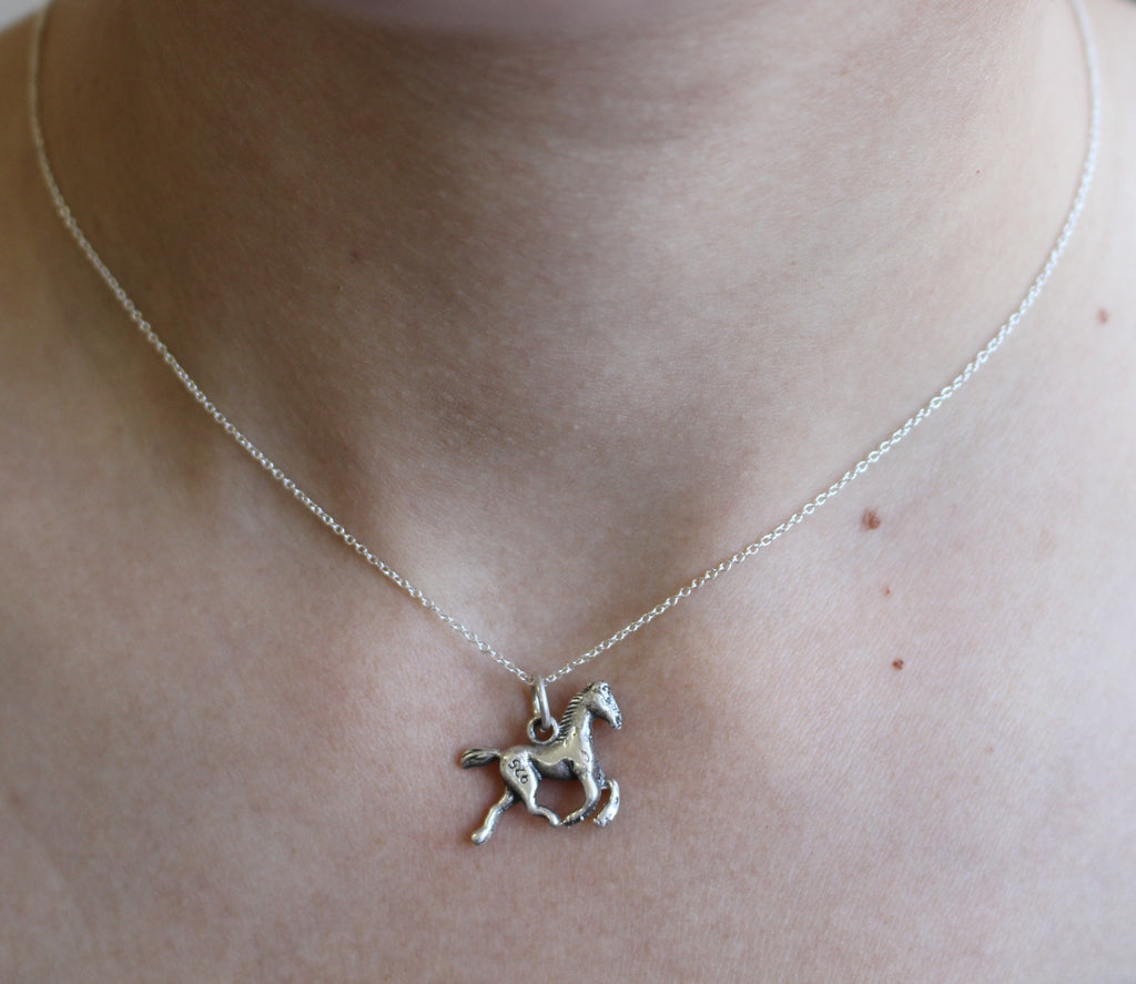 TINY HORSE STERLING SILVER PENDANT