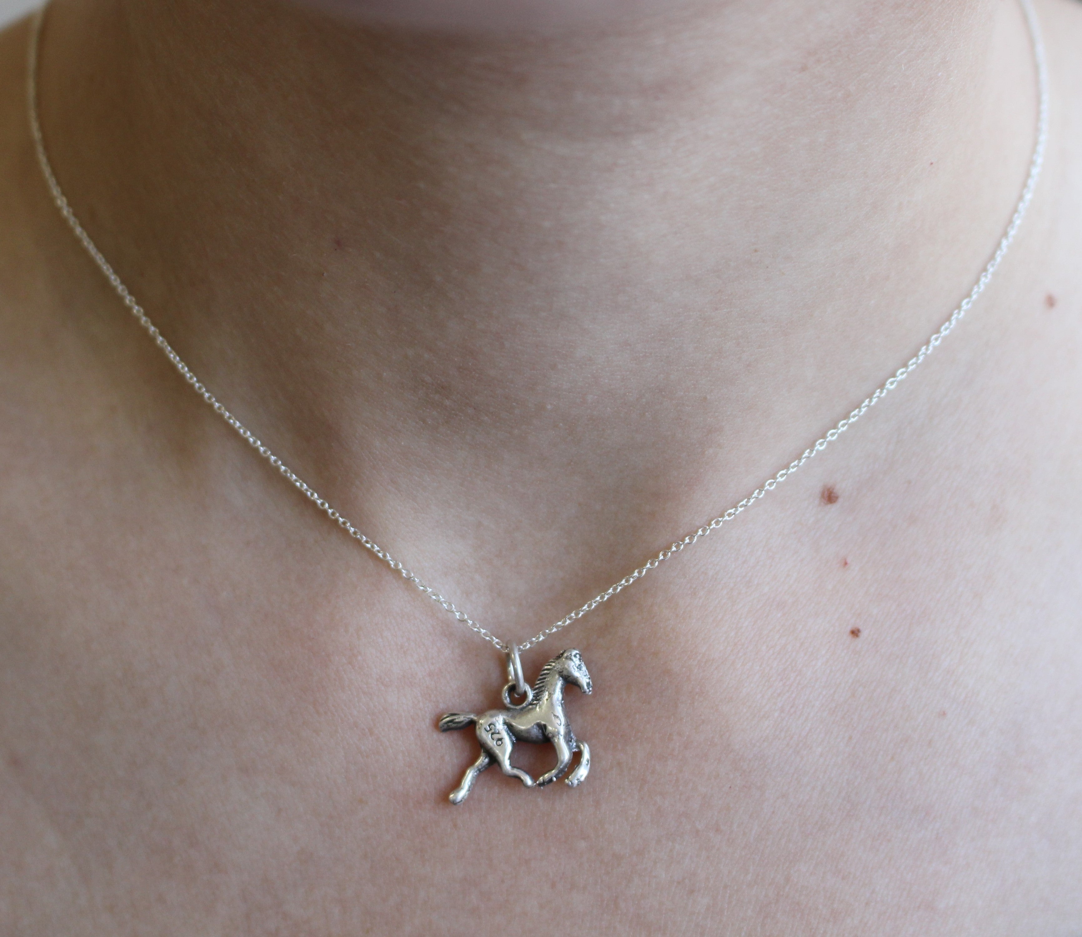 TINY HORSE STERLING SILVER PENDANT