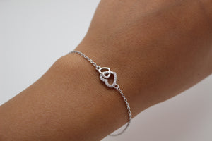 CUBIC ZIRCONIA STERLING SILVER BRACELET (HEARTS)