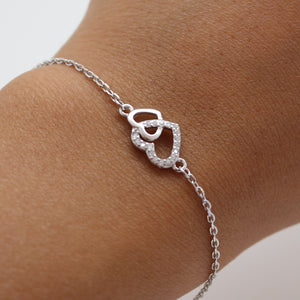 CUBIC ZIRCONIA STERLING SILVER BRACELET (HEARTS)