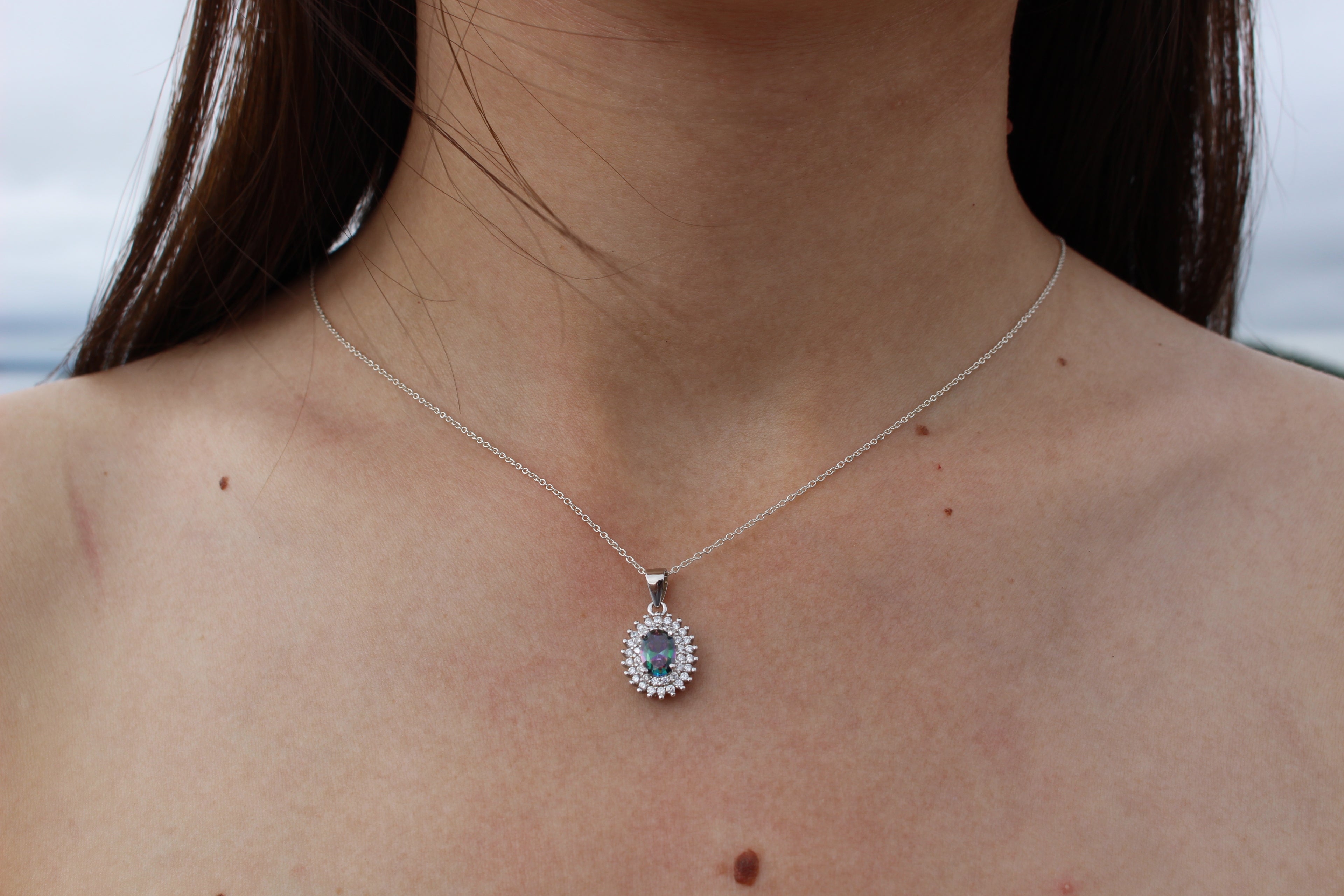 BLUE and MYSTIC TOPAZ CUBIC ZIRCONIA STERLING SILVER PENDANT (OVAL)